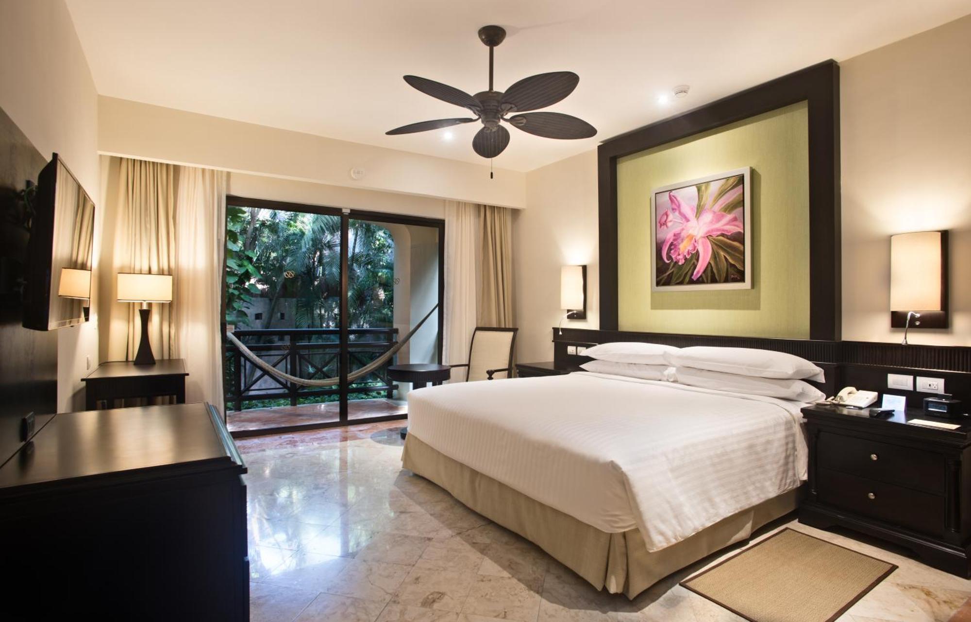 Occidental At Xcaret Destination Hotel Xcaret Park Luaran gambar A bedroom at the Hard Rock Hotel